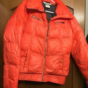Bright orange Columbia winter jacket